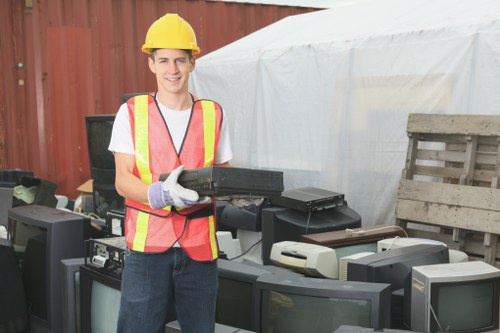Volunteers from local charity receiving donated furniture and goods